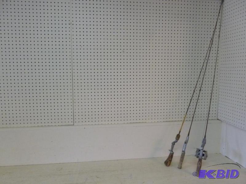 lot 51 image: Lot of three vintage steel fishing rods, one ...