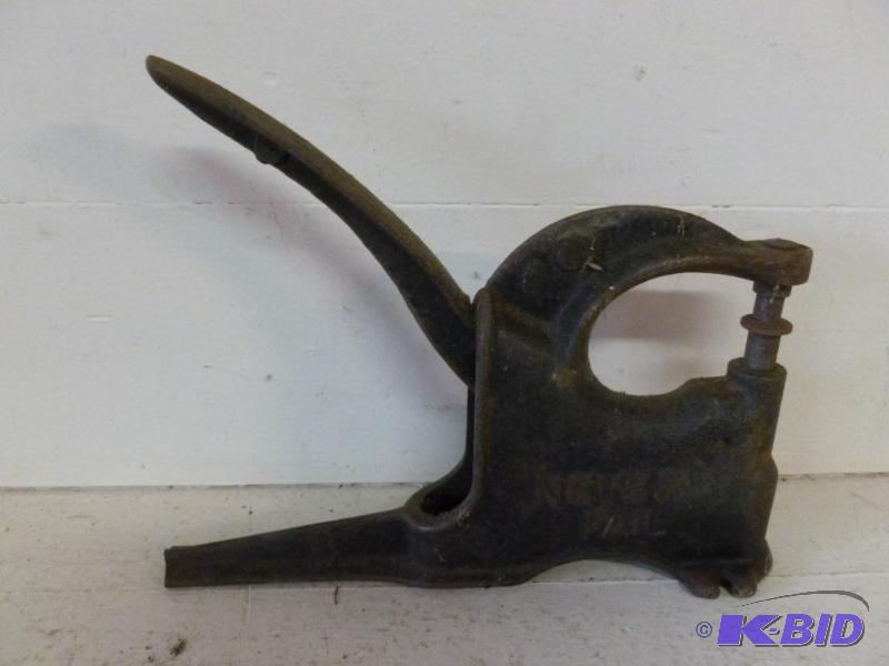 lot 64 image: Large Vintage Never Fail cast iron leather pu...
