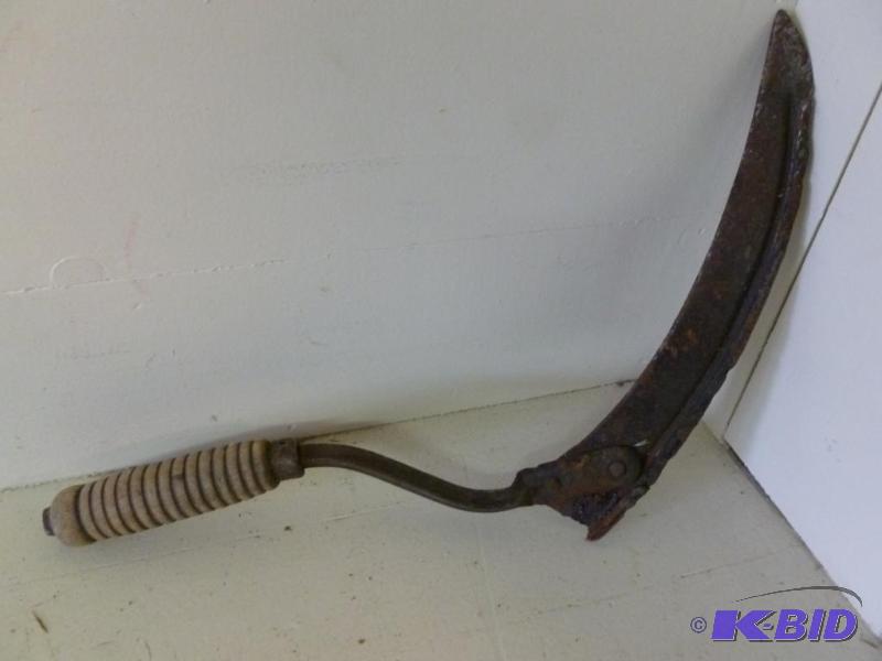 lot 67 image: Vintage wood handled sickle knife that measur...