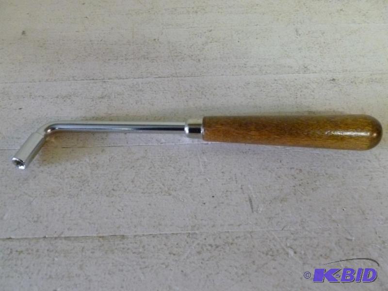 lot 75 image: Large wood handled star wrench that measures ...