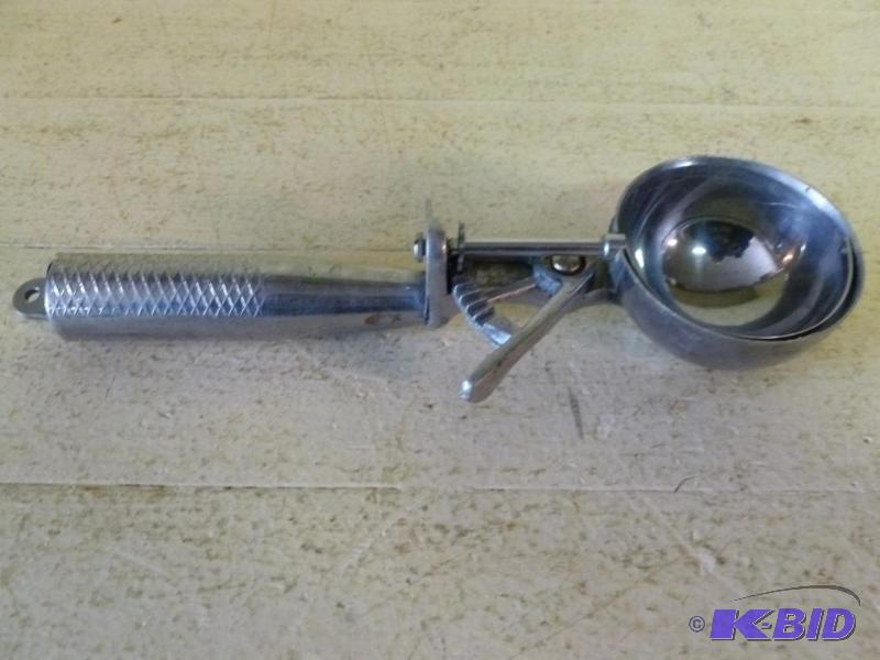 lot 85 image: Vintage metal ice cream scoop....