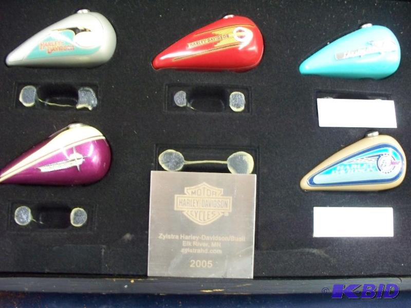 lot 26 image: Harley gas tank collection...