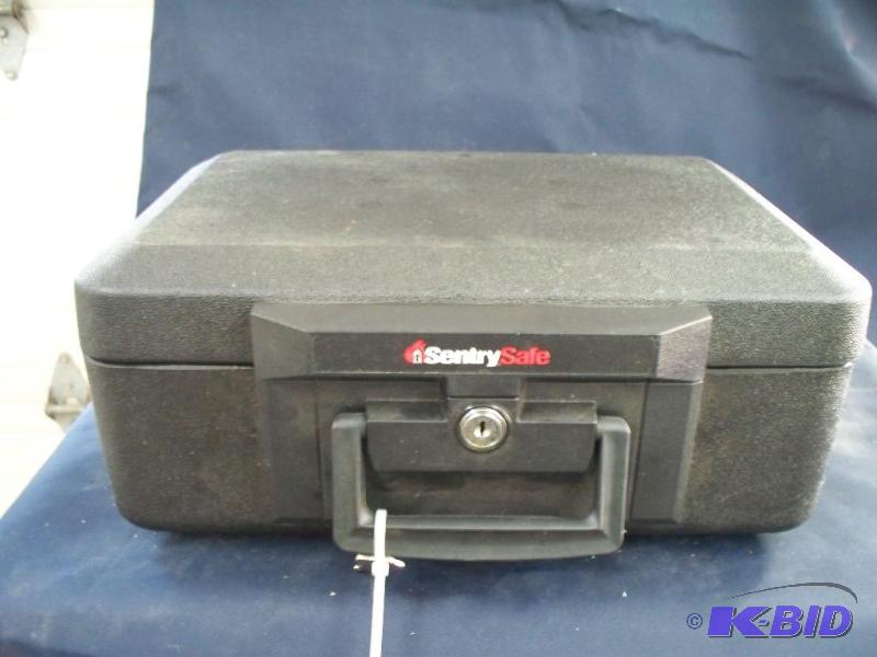 lot 46 image: Sentry Safe with key...
