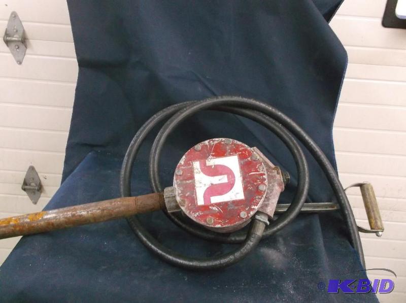 lot 64 image: Vintage gas pump with hose...