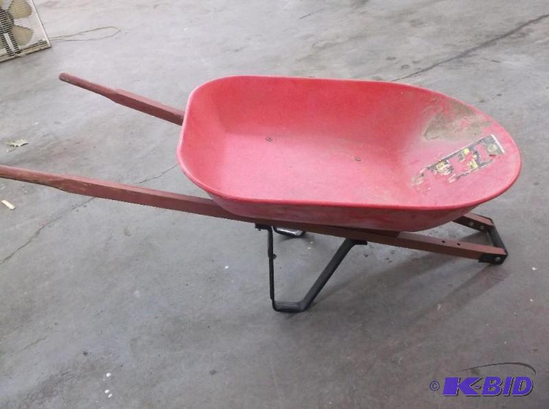 lot 65 image: &nbspPlastic Wheel Barrow  missing whee...