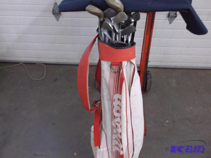 lot 74 image: set of golf clubs...