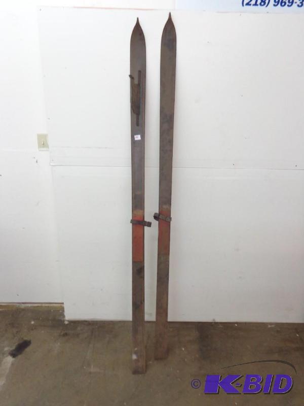 lot 14 image: Pair of Old &quotRecord" Skis wLeather...