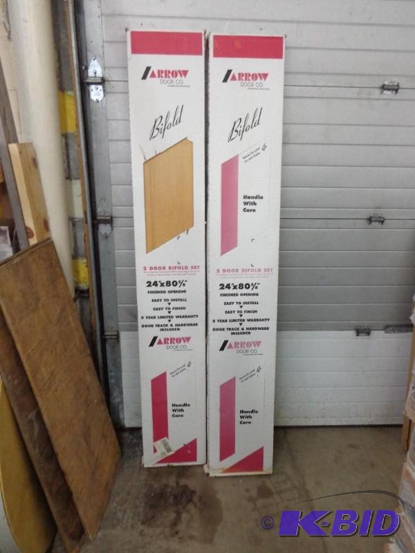 lot 21 image: (2) Arrow Door Company Bi-Fold Doors 24"...