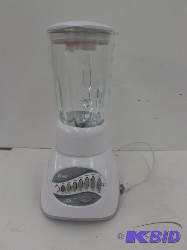 lot 40 image: Oster 12 Speed All Metal Drive Blender Pulse,...