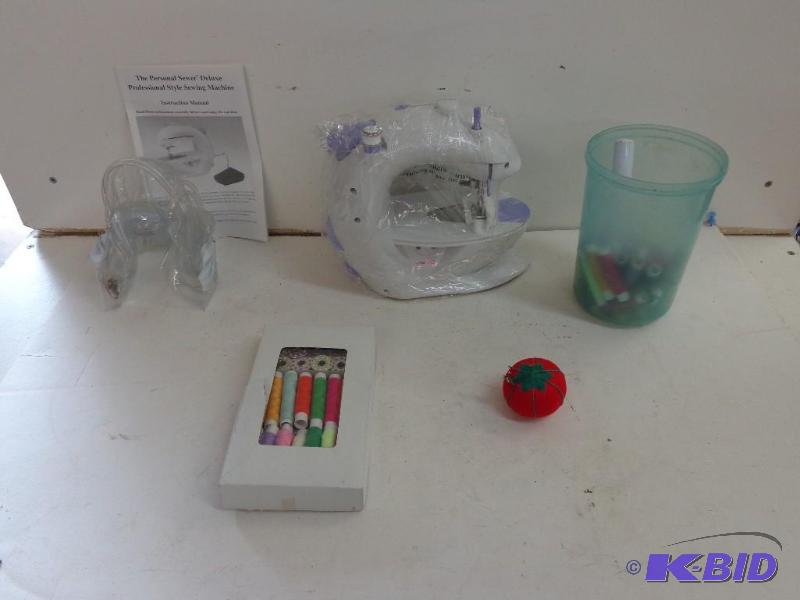 lot 71 image: Personal Deluxe Sewing Machine Package is Pro...