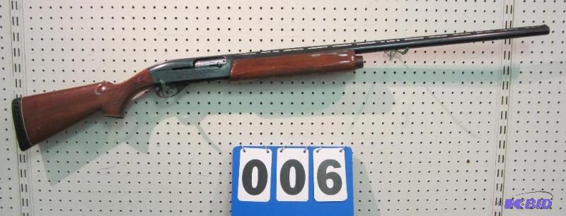 lot 6 image: Remington Model 1100 12 Gauge Shotgun