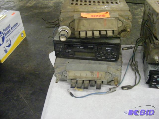 3 Radios,2 unknown, 1 is a Clarion Cassette p...