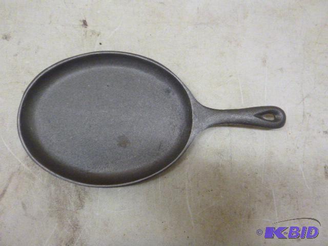 lot 104 image: Small Cast Iron Frying Pan...