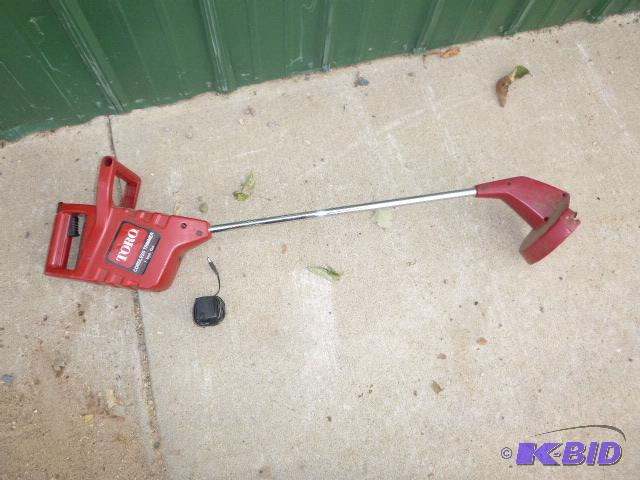 lot 158 image: Toro Weed Whip 7" cordless with charger....