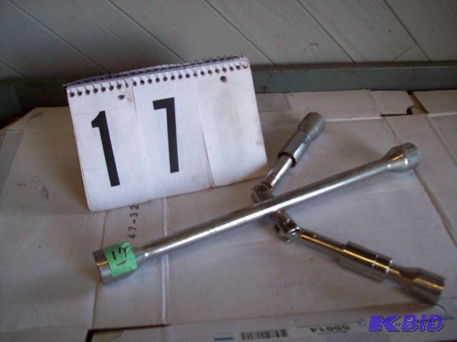 4 Way Collapsible Lug Wrench...