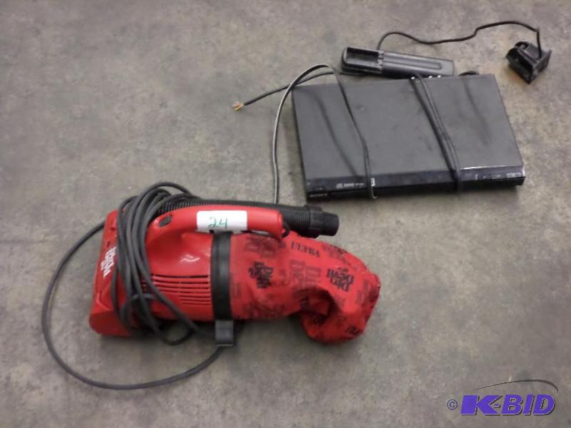 lot 24 image: (1) Dirt Devil Handheld Vac & (1) Sony DV...