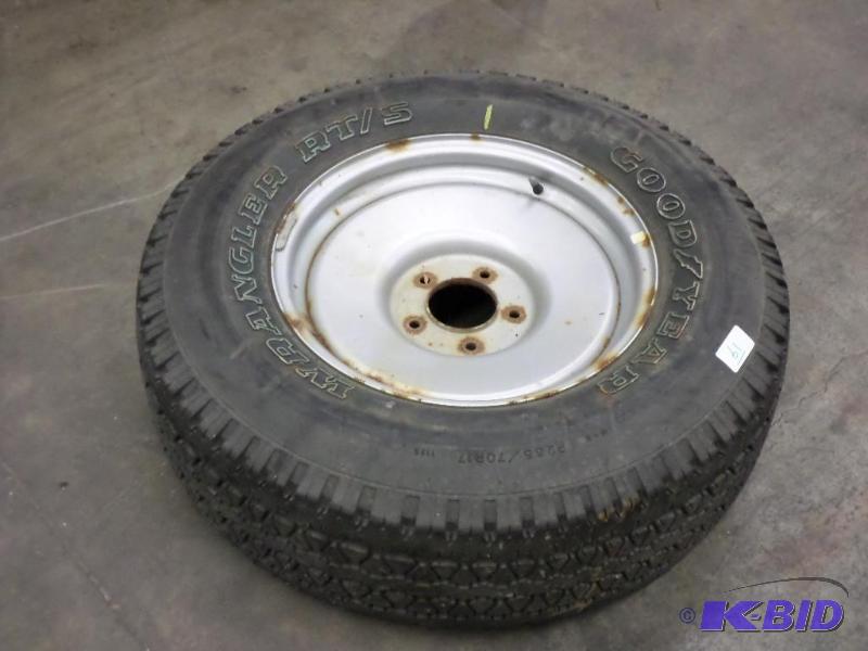 lot 61 image: (1) 5-Lug Steel Rim With Goodyear 2657017 T...