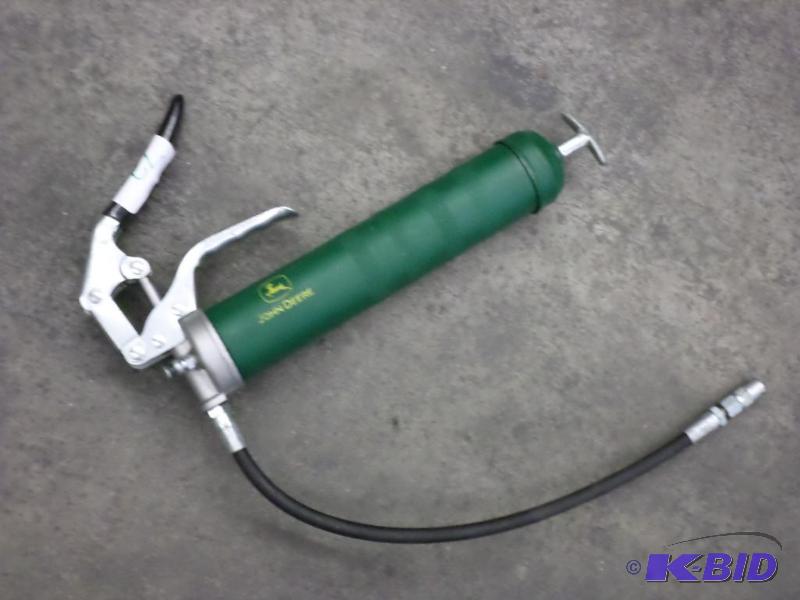 lot 72 image: John Deere Grease Gun...
