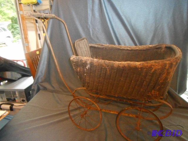 lot 10 image: Antique Doll buggy