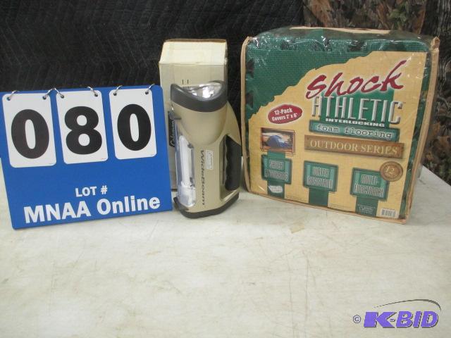 lot 00080 image: Foam flooring  with  Coleman flashlight
