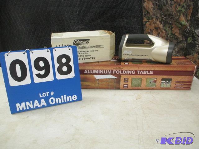 lot 00098 image: Aluminum folding table With Coleman flashlight