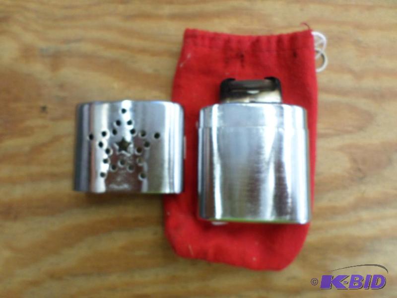 lot 20 image: Vintage Pocket Hand Warmer With Bag...
