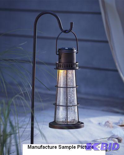 lot 97 image: Hanging Solar Lantern  -Lights for up to 8 ho...