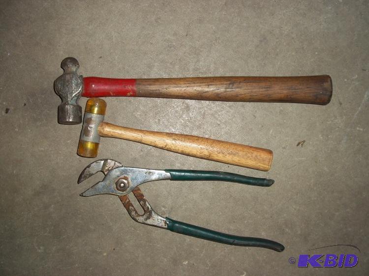 2 hammers and adjustable pliers...