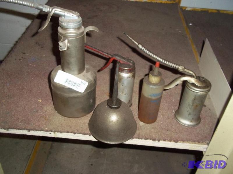 4 oil cans...