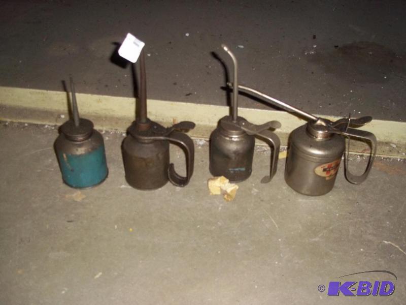 4 oil cans...
