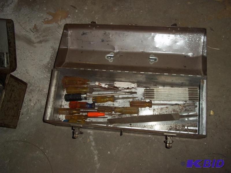 Tool box with saw blades, screwdrivers,foldin...