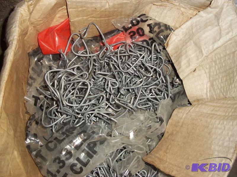 Box of new t post wire clamps...