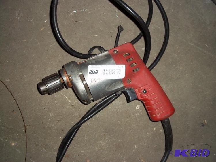Milwaukee 38&quot drill (works)...