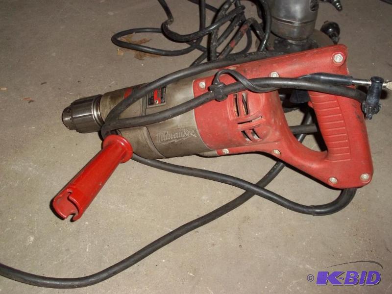 Milwaukee 12&quot drill (works)...