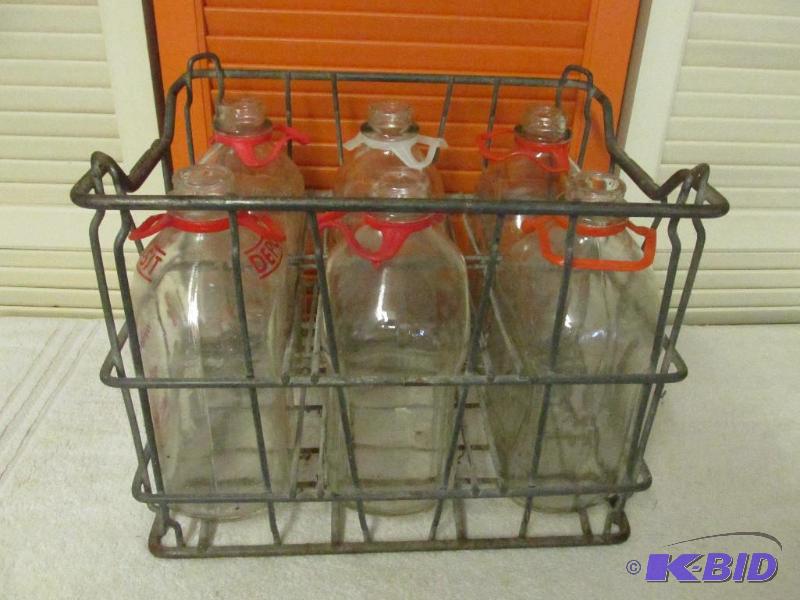 lot 5 image: 6 Glass 12 Gallon Bottles (all with hand hold) in a Heavy Duty Metal Carrier