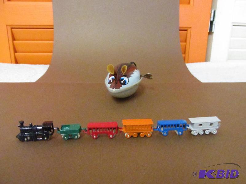 lot 94 image: Vintage Hilarious Wind-Up TIN Mouse with a Twirly Tail and a Vintage Itty Bitty Train