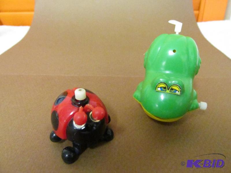 lot 96 image: Very Cute Wind-Up Ladybug and Frog with Whirling Tail
