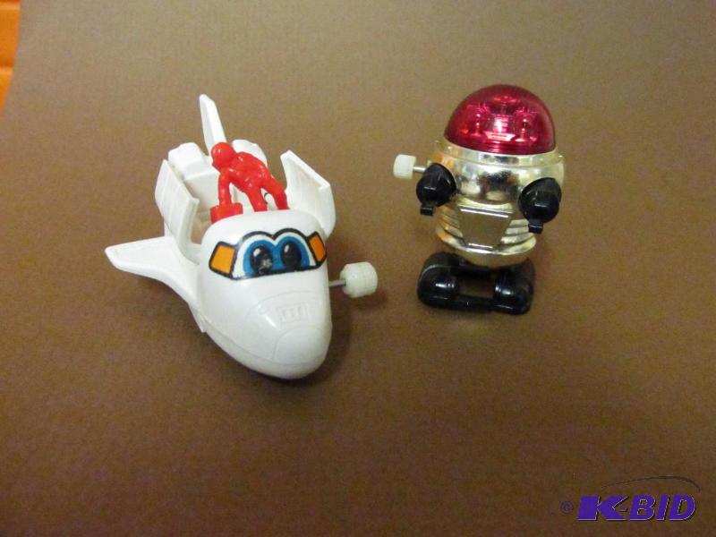 lot 97 image: An Amazing Wind-Up Shuttle With an Astronaut and  Believe It or Not a Lost In Space Robot