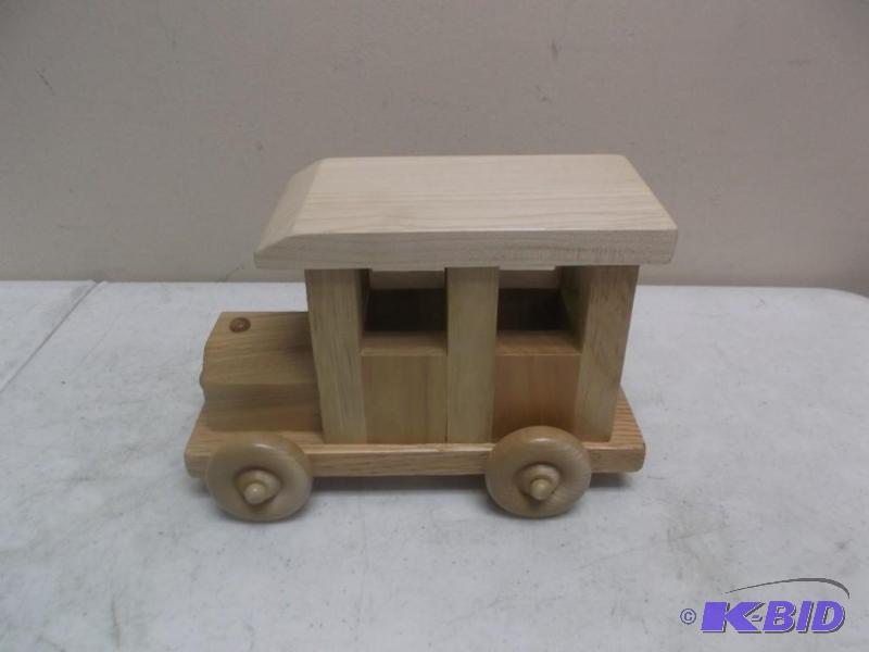 lot 23 image: Wood Toy Car....