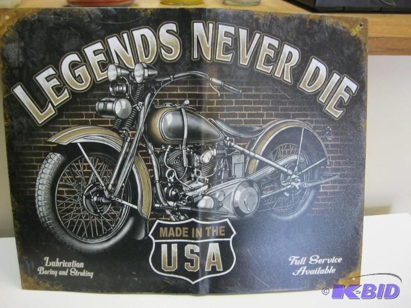 lot 25 image: Metal motorcycle sign bent and has writing on...