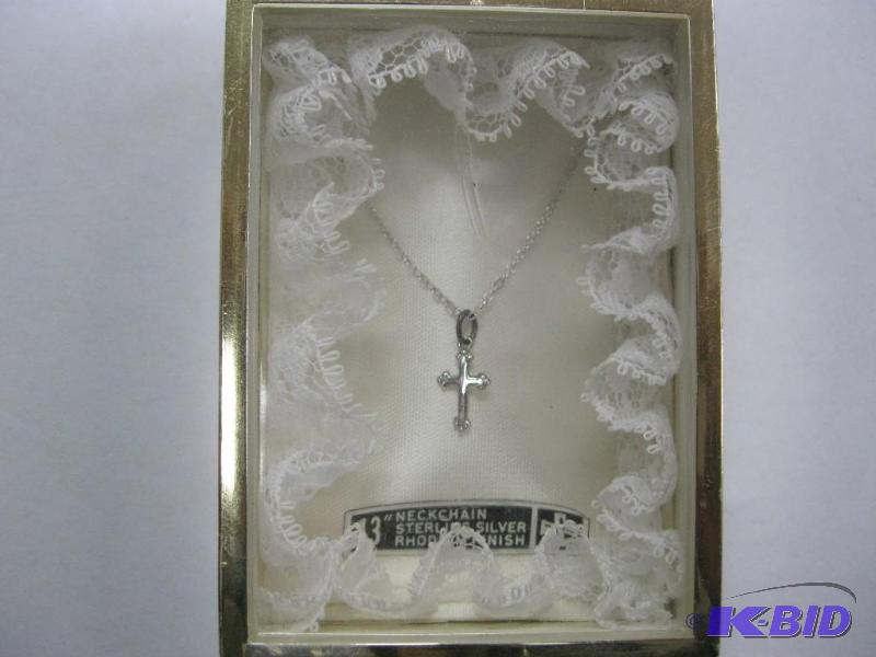 lot 32 image: 13" inch sterling silver chain and cross...