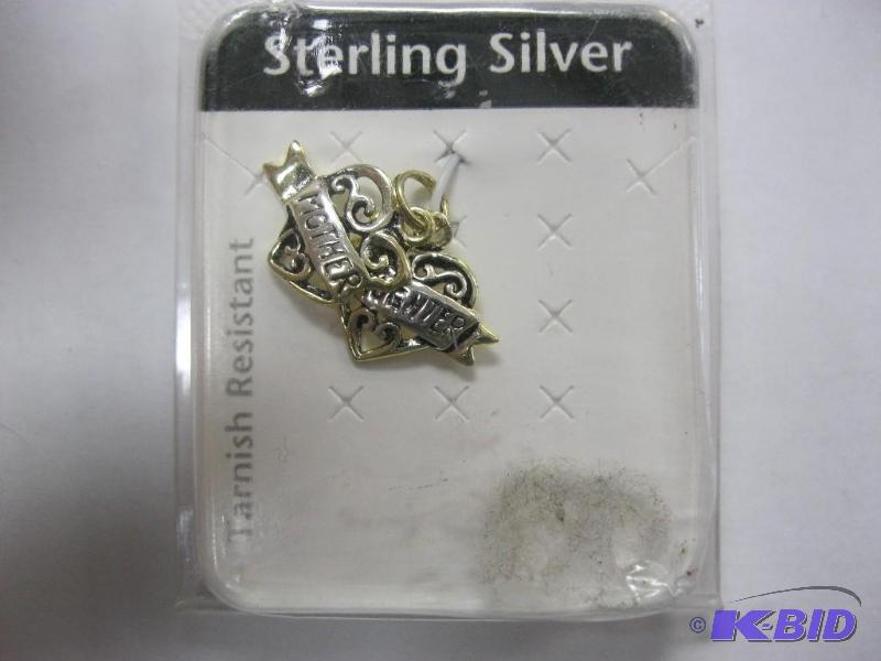lot 34 image: Sterling silver mother daughter charm....