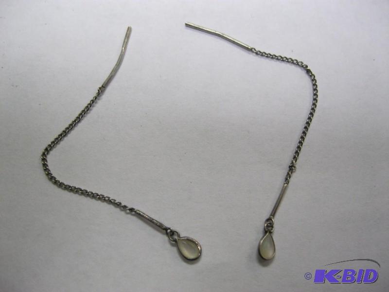 lot 43 image: Vintage silver earrings with white stones....