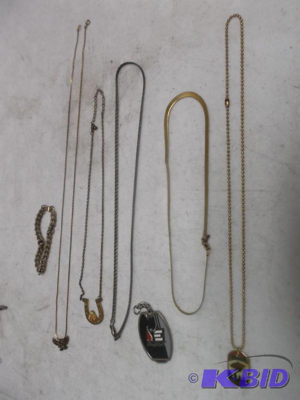lot 51 image: Lot of fashion necklaces Wild dog tag....