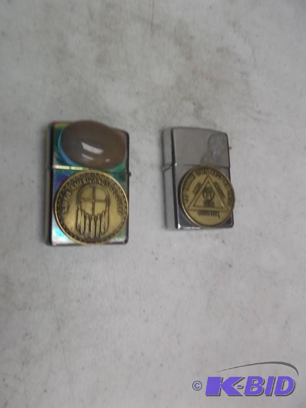lot 54 image: Pair of Zippo&nbsplighters. Someone Custom A...
