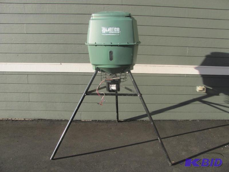 lot 102 image: HUNTEN OUTDOORS 250-lb Tripod Game Feeder wit...
