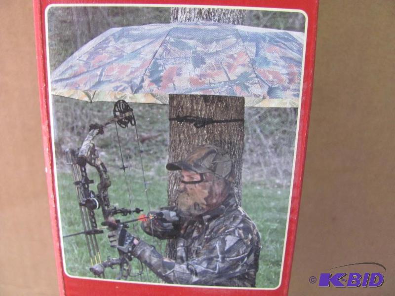 lot 52 image: Stay dry while hunting with this NEW (in orig...