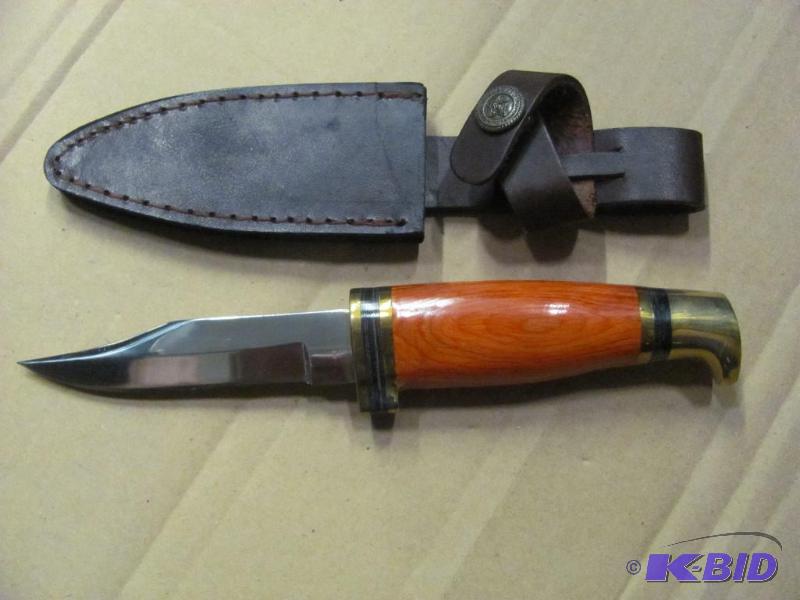 lot 91 image: Heres a great new hunting knife NEW (in ori...