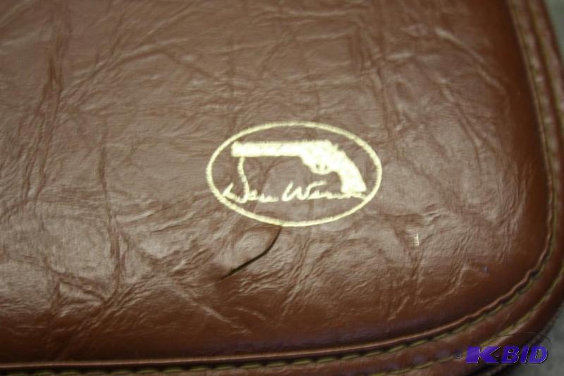 lot 190 image: Lot of (1) soft side gun case. Brown leather....