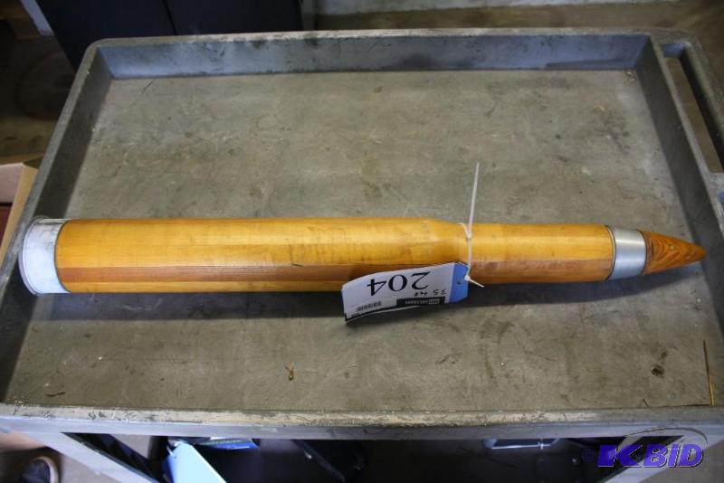 lot 204 image: Lot of (1) Large wooden bullet with metal pla...